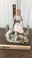 Girl figurine w/dogs & squirrel figurine