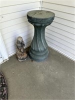 Plant stand and statue