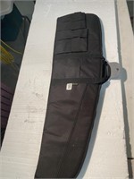 A R padded gun case with clip storage. 40 inches