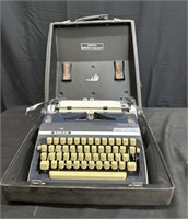 Adler portable typewriter & case
