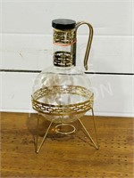 Coffee carafe on metal stand