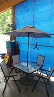 Glasstop Patio table, 4 Chairs, Umbrella & Stand