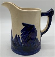 large Old Sleepy Eye pottery pitcher