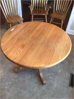 Oak pedestal table 41 in diameter-also includes 18