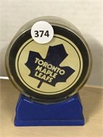 Toronto Maple Leafs Hockey Puck In Stand