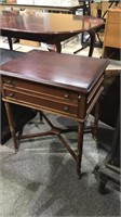 Mahogany two drawer end table with the stretcher