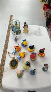 Toy ducks and Disney globe and toys