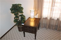 Side Table With Table Lamp And Small Faux Tree