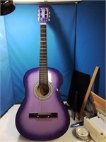 Beautiful purple 6 string guitar great condition