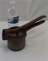 Primitive potato/rice press