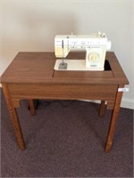 Singer electric sewing machine with table 34 in x