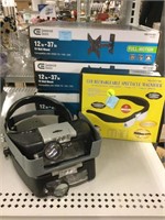 Headgear magnifiers and 3 NIB tv mounts.
