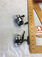 2 small fishing reels - 1 Zebco