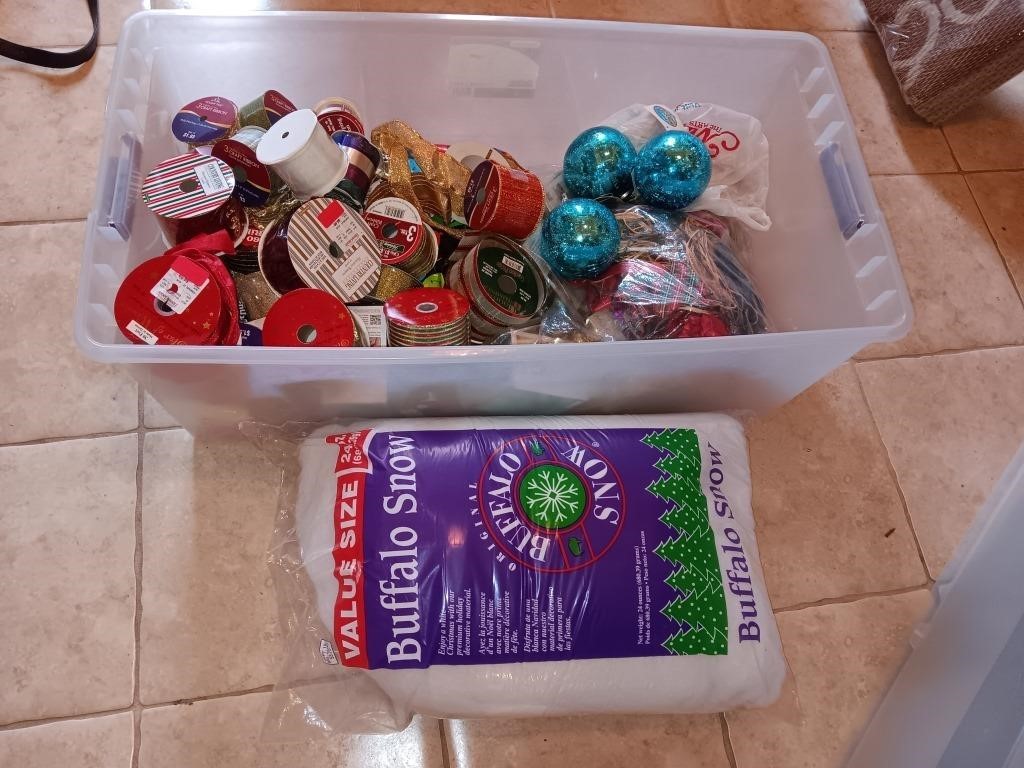 Plastic Bin of craft, ribbons and bubbles.