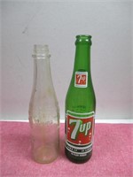 2 Older Soda  Bottles (7ups,Tomatoe Farm)