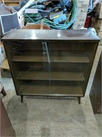 Cabinet with Sliding Glass Doors measure 3' x 1'