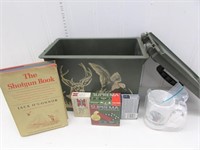 Plastic dry box containing “The Shotgun Book” by