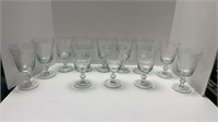 (12) cut glass wine stems, (1) w/ small chip