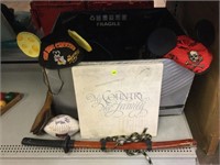 Decorative samurai sword, Disney hats, gun case