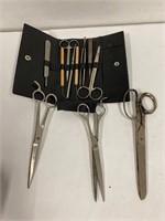 Hair scissors  and manicure set.