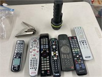 Lot of remotes for tv/ flashlight/ official