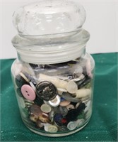 Jar of buttons and sewing