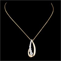 0.58ctw Diamond Pendant in 14K Gold