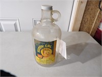 half gallon glass jug with old label