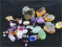 Huge lot of gem stones taken from melted jewelry