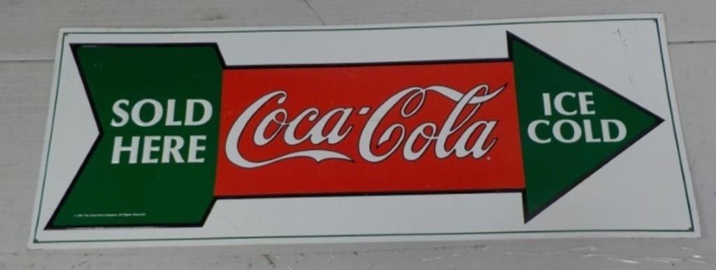 Coca-Cola metal sign.