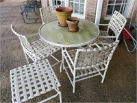PATIO TABLE, 4 CHAIRS AND FOOT STOOL