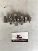 Universal/ swivel wrench adapters