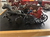 VINTAGE CAST IRON FIRE ENGINE AND HORSE