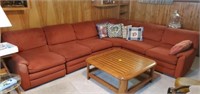Brick red sectional couch & pillows