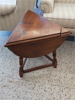 Vintage triangular drop leaf side table.