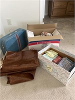 Lot of fabric with vintage suit case