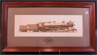 A framed photograph of C&IM locomotive