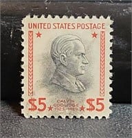 U.S. 5 dollar postage stamp used