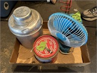 aluminum water jug and electric fan