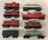 lot of 8 Lionel Train Cars-Caboose, Tanker,other