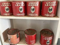 Tobacco tins with nails