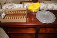 wood cutting board, silver tray, Tupperware