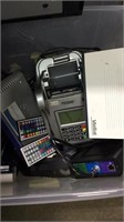 Tote with lid, credit card machine, vcr player,