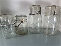 4 Vintage Clear Ball Jars with wire nails
