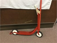 Vintage red child’s scooter. No screws in the