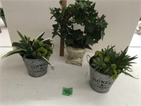 fake succulents in metal/ ceramic pot
