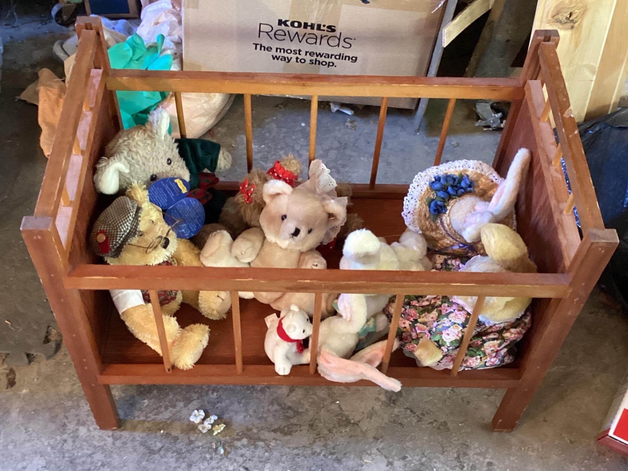 Collection of bears and baby crib