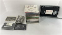 CDs including Elvis Presley, cassettes, VHS tape