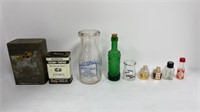 Vintage cans, miniature glass bottles including