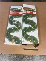 Two Boxes of 25 Feet of Lighted Garland/ works???